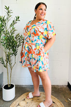 Load image into Gallery viewer, Tropical Trance Coral Tropical Floral Surplice Woven Romper